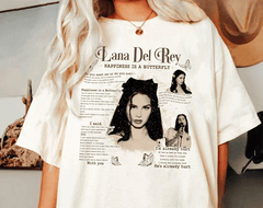 a woman wearing a t - shirt with a picture of a woman's face