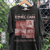 a black t - shirt with a picture of a woman on it