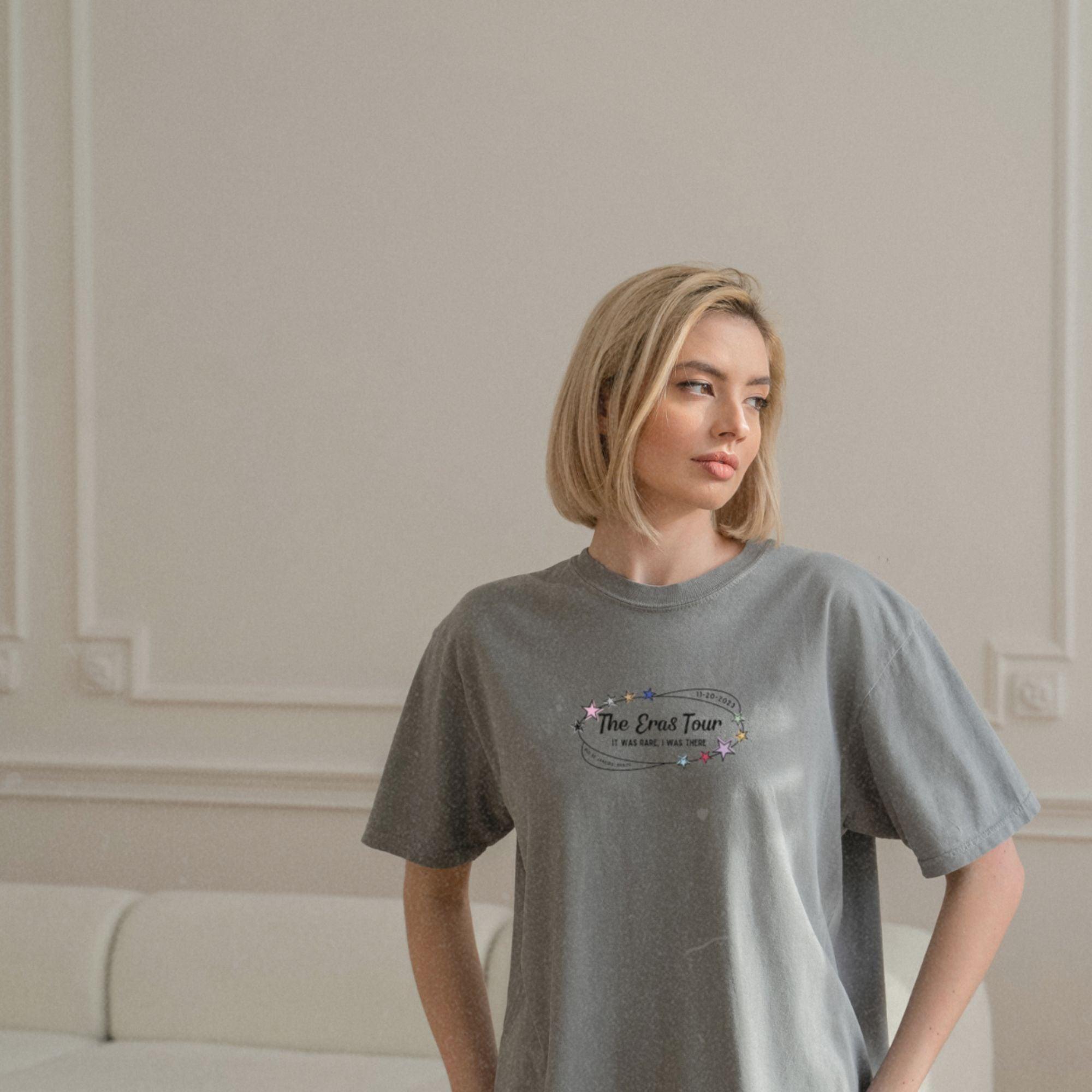 a woman standing in front of a white couch