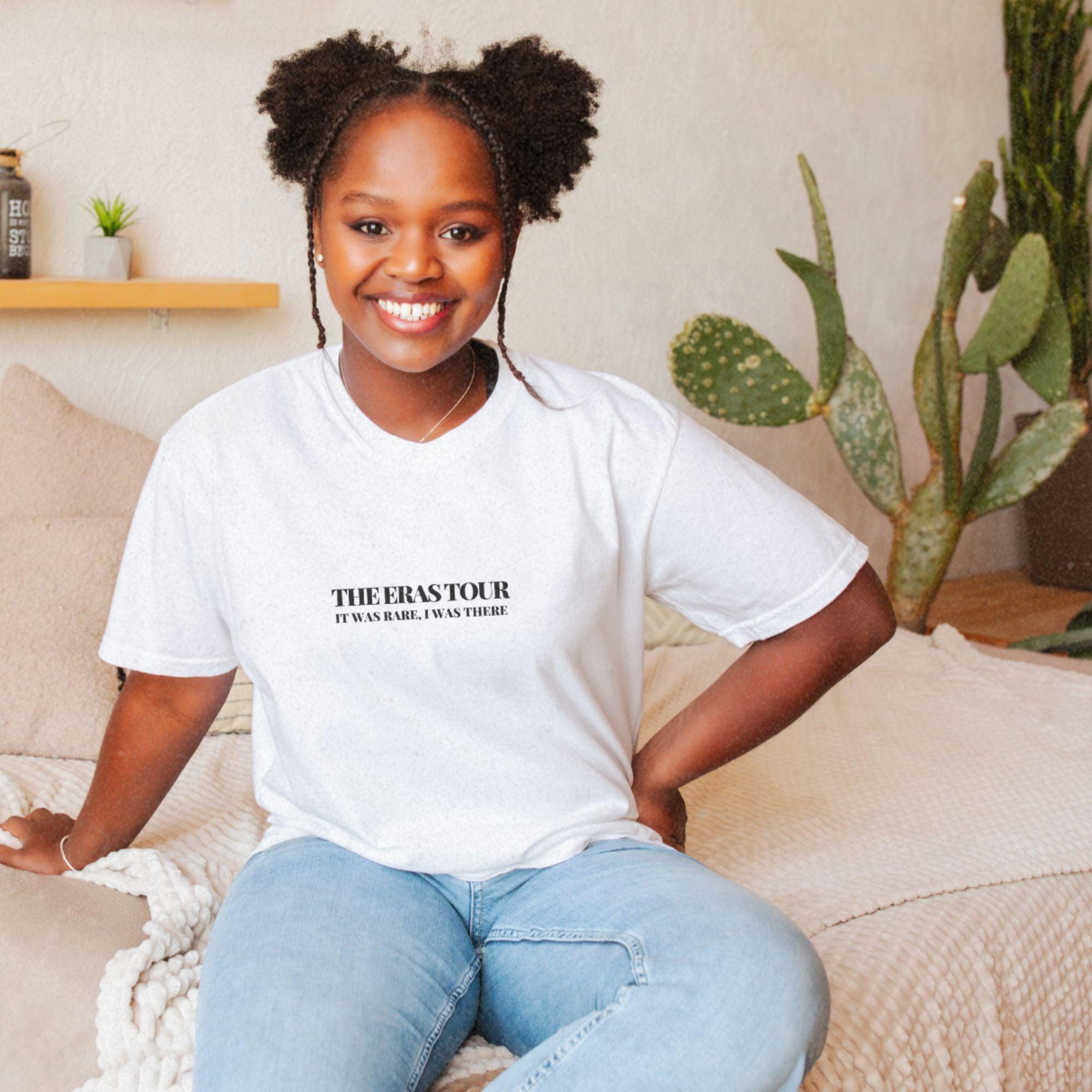 a woman sitting on a bed smiling for the camera