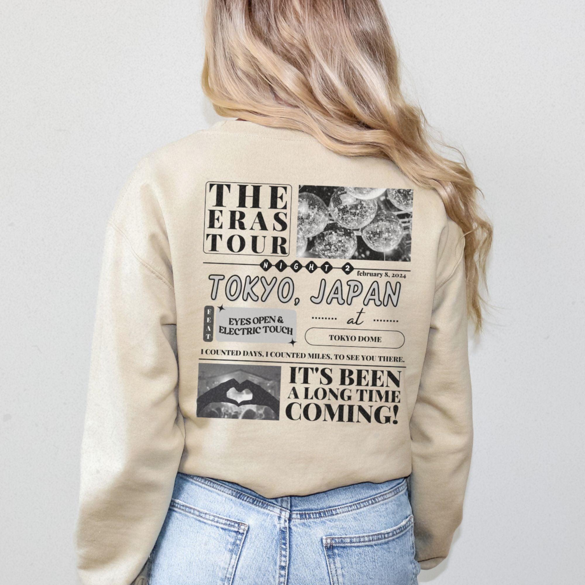 a woman wearing a jacket with a picture on it